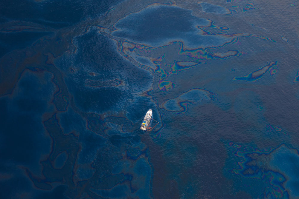 Philippe Cousteau dives in oil