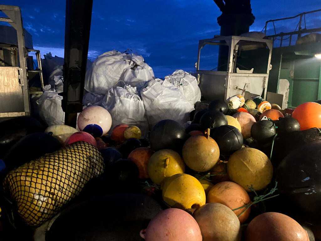 piles of trash on boat deck