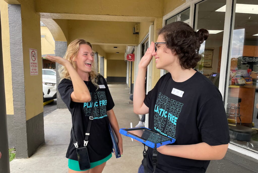 Plastic Free Cities participants high five